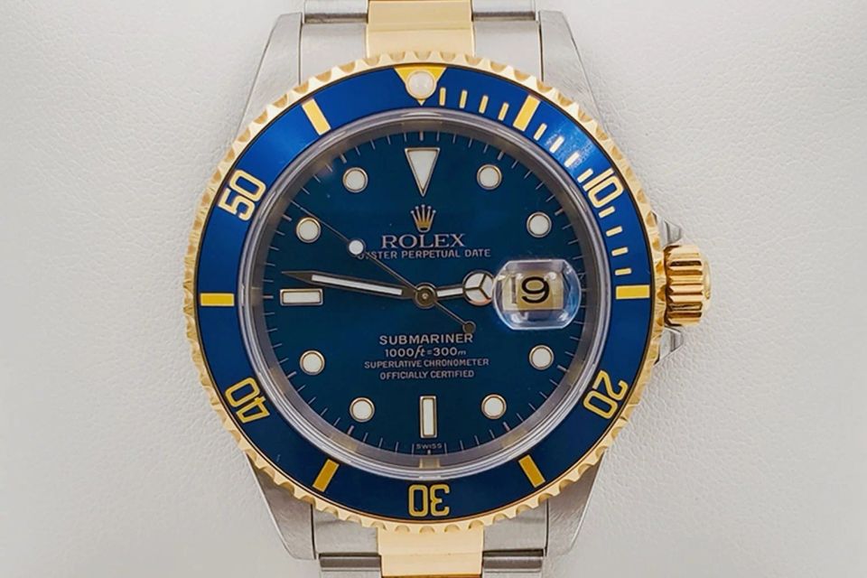 Men s rolex 40mm submariner date oyster perpetual two tone 18k yellow gold stainless steel watch with blue dial and blue bezel pre owned 16613 ef47477b c358 447e 8d