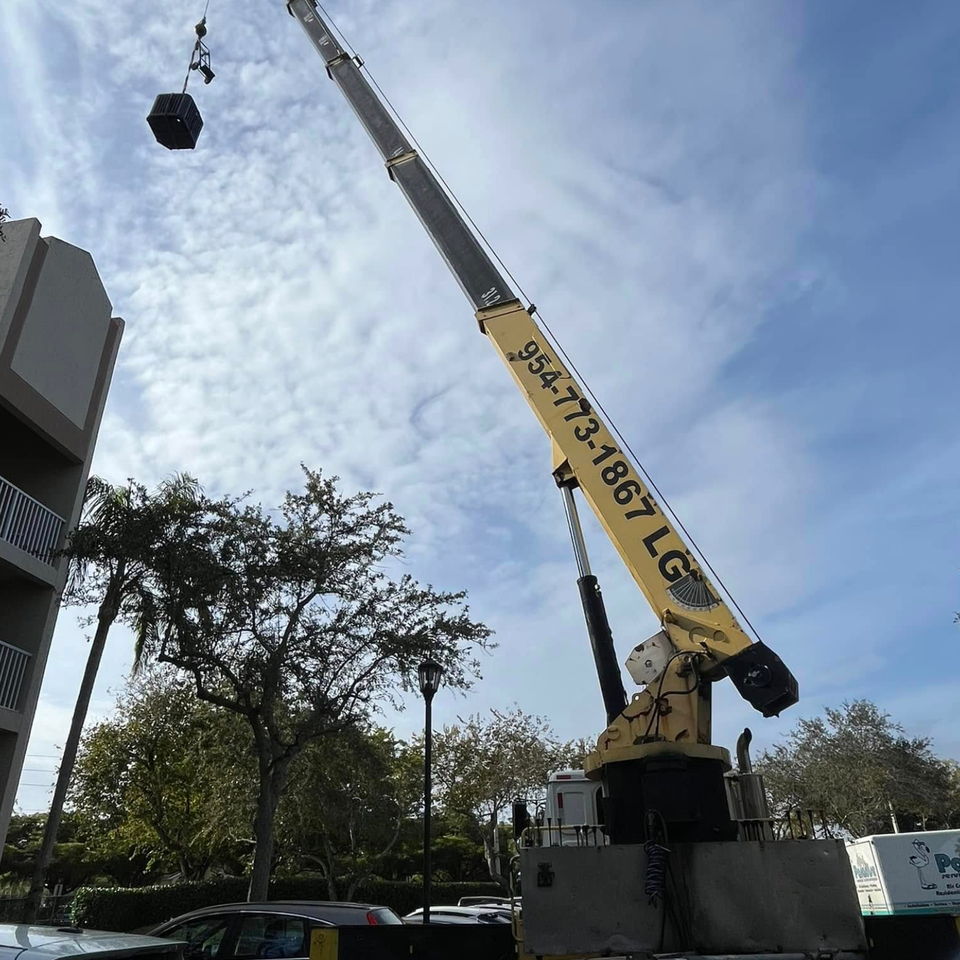 Truck crane service for condominium 