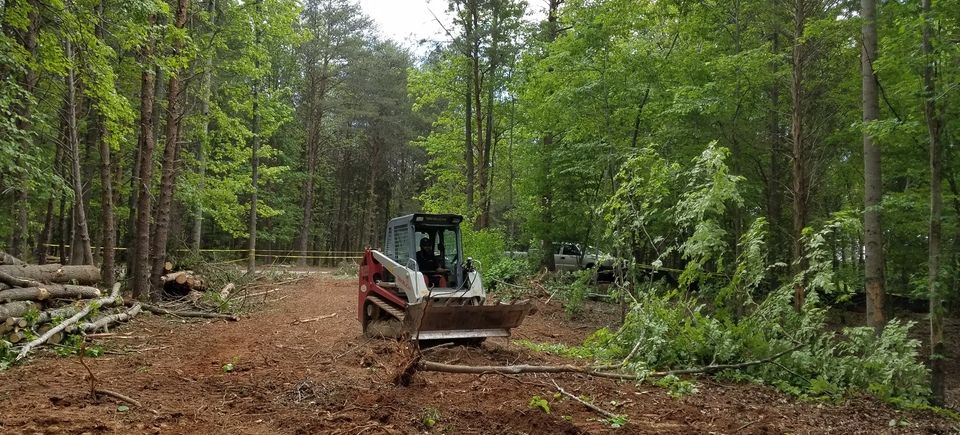 Asphalt Paving, Repair and Crack Filling, Grading, Excavating, Footings & Concrete Pads, Gravel Delivery, Demolition, and Dump Truck Contract Hauling.