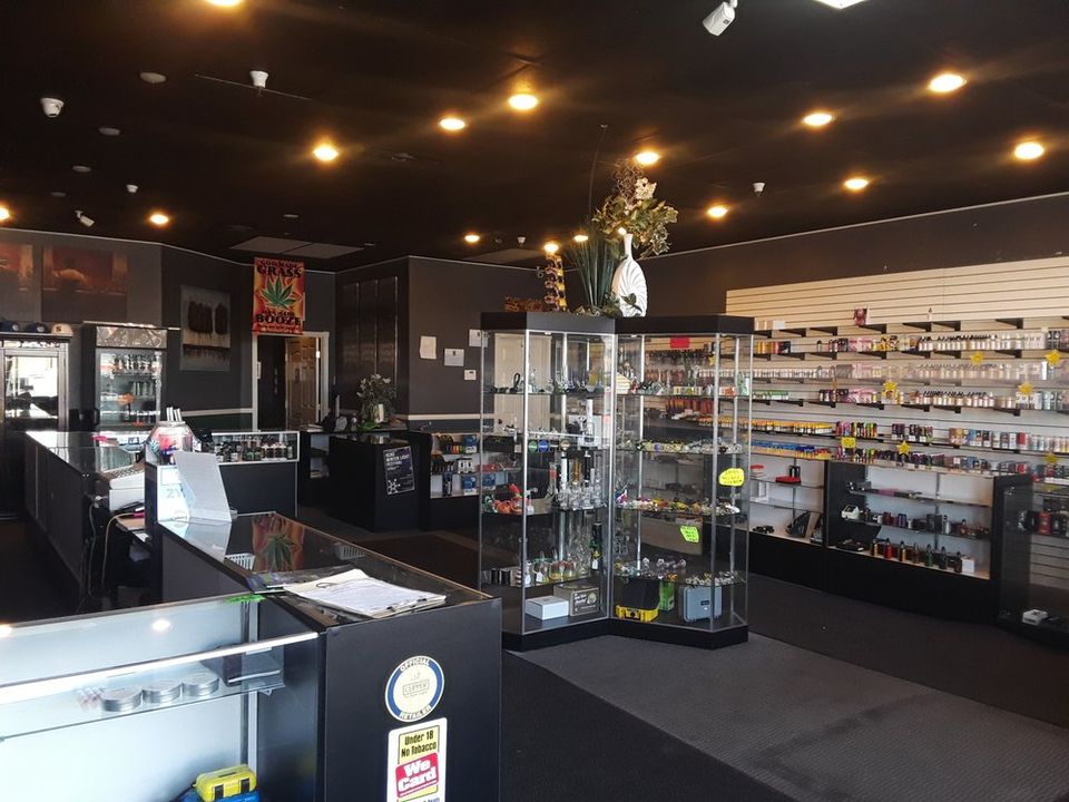 Interior of Yum Yum Vape Shop showcasing vaping products and accessories.