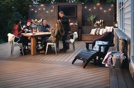 Nuredo magazine   tulsa oklahoma   remodeling   deck design 101   13898 a 300   family sitting at table on deck20180615 17953 154kcb3