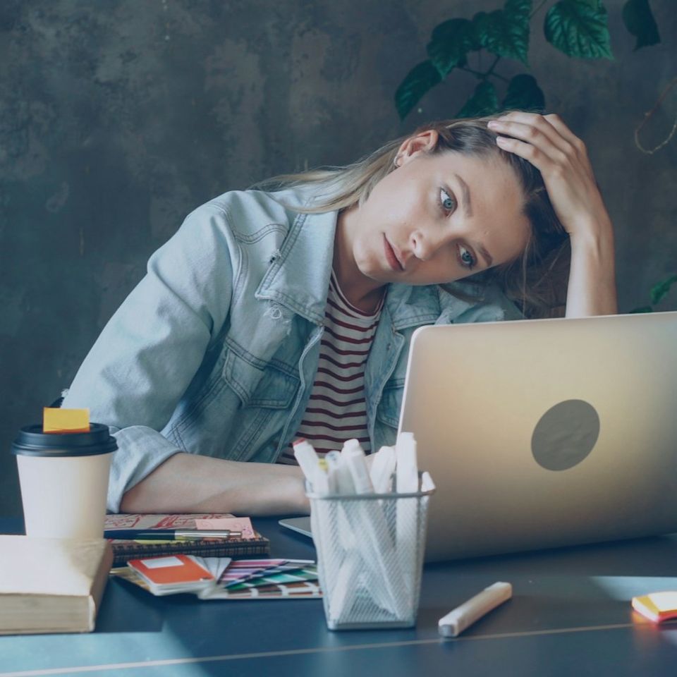 Stressed female business owner trying to figure out how to use a cheap DIY builder