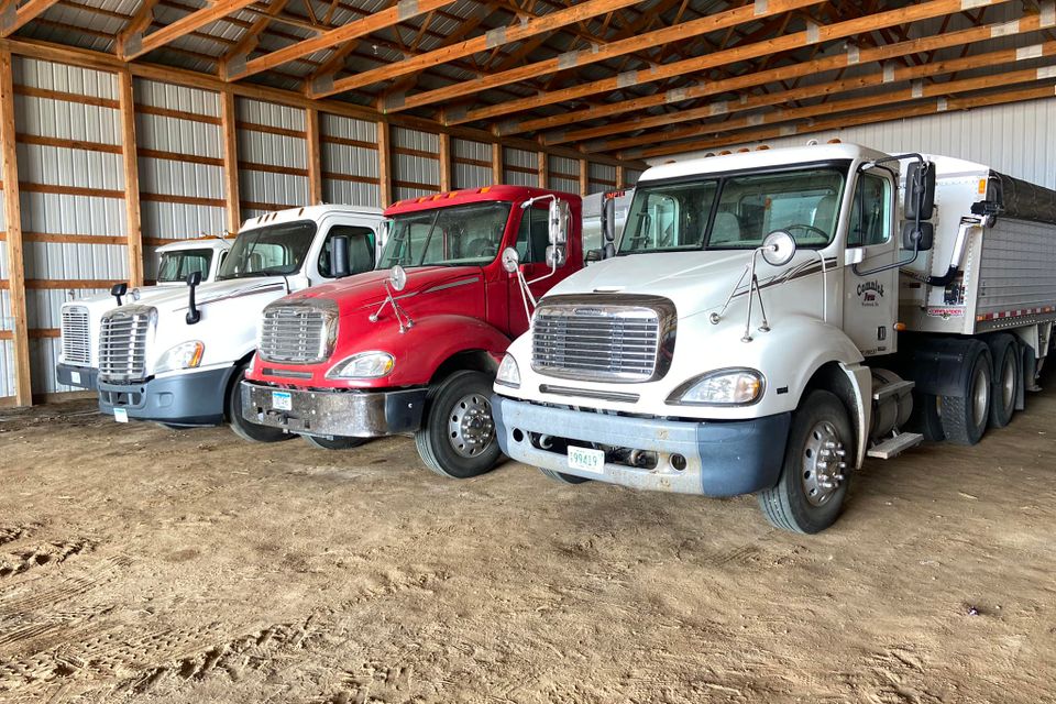 4 trucks lined up