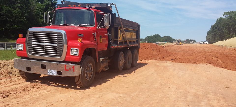 Asphalt Paving, Repair and Crack Filling, Grading, Excavating, Footings & Concrete Pads, Gravel Delivery, Demolition, and Dump Truck Contract Hauling.