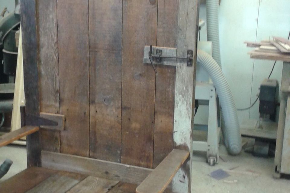 Repurposed barn wood to high back coat tree bench