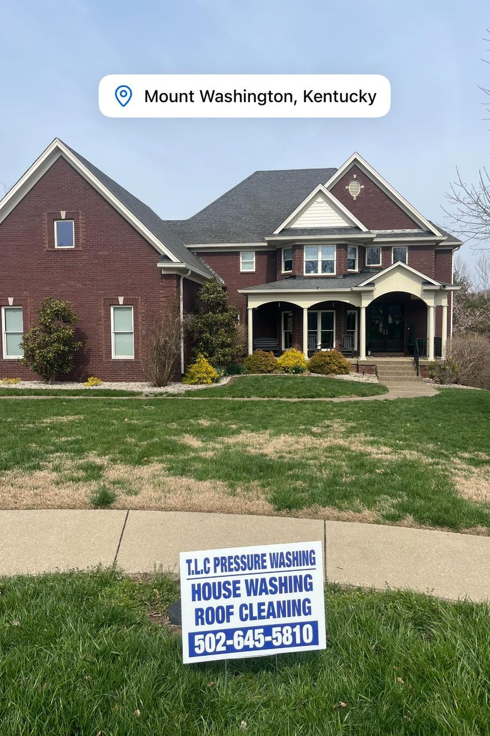 Professional soft wash house cleaning on white vinyl siding in Louisville, KY by TLC Pressure Washing