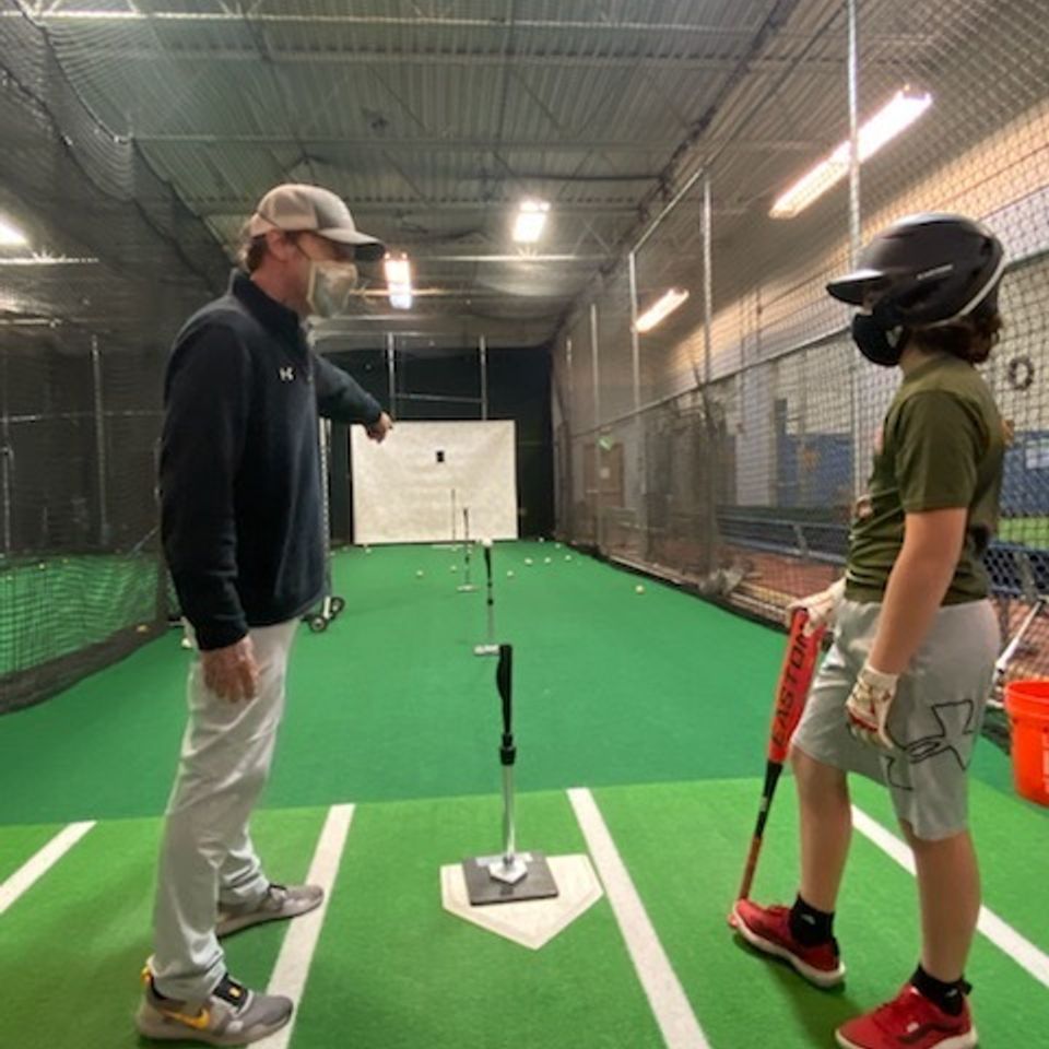 Coacht batting practice baseball