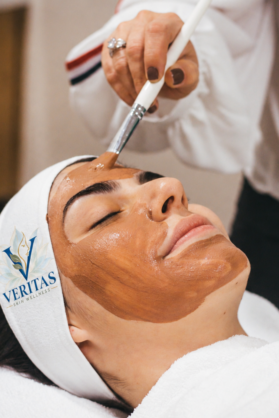 Custom facial treatment with skincare mask at veritas skin wellness in folsom, california