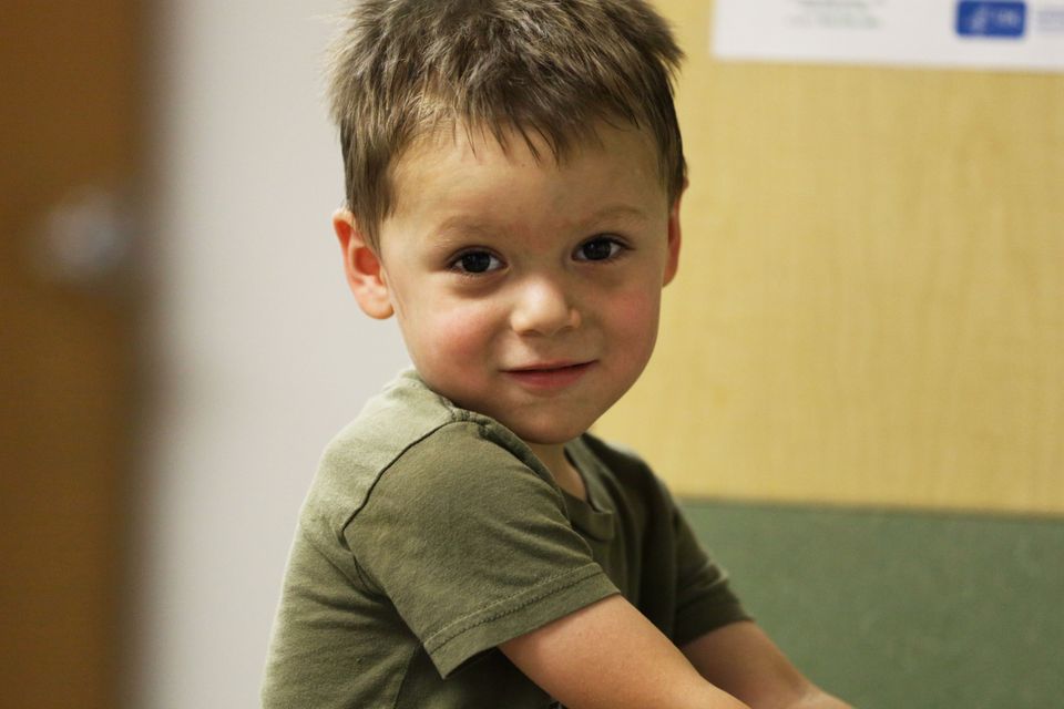 Boy watching hands