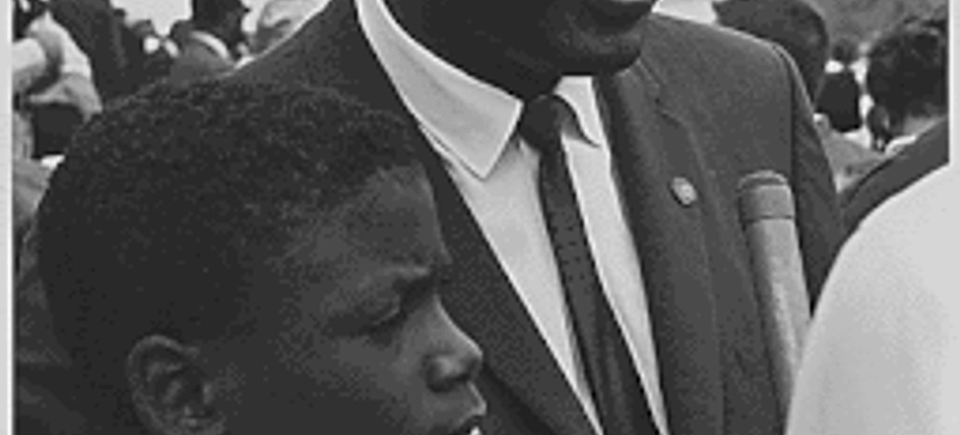 Civil rights march on washington  d.c. former national baseball league player  jackie robinson with his son.  08 28 1963
