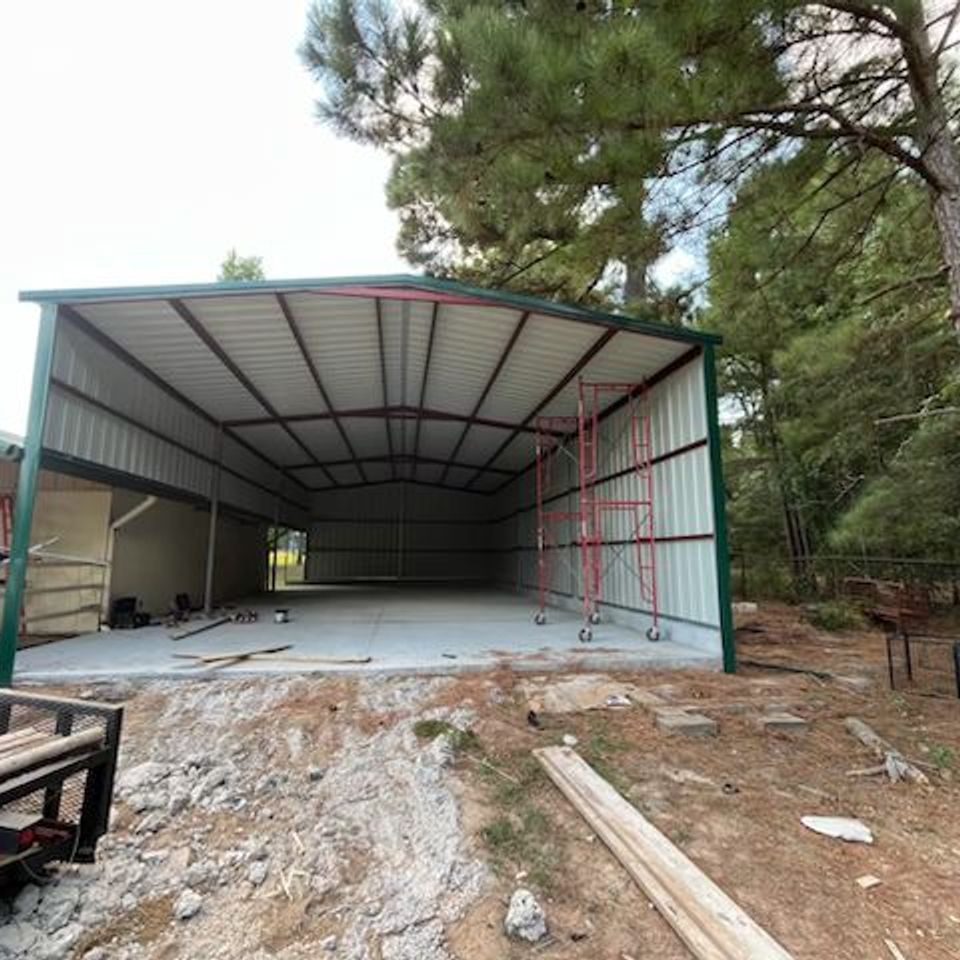 Steel frame workshop under construction in Houston by Marquez Welding, showing custom metal structure and support beams.