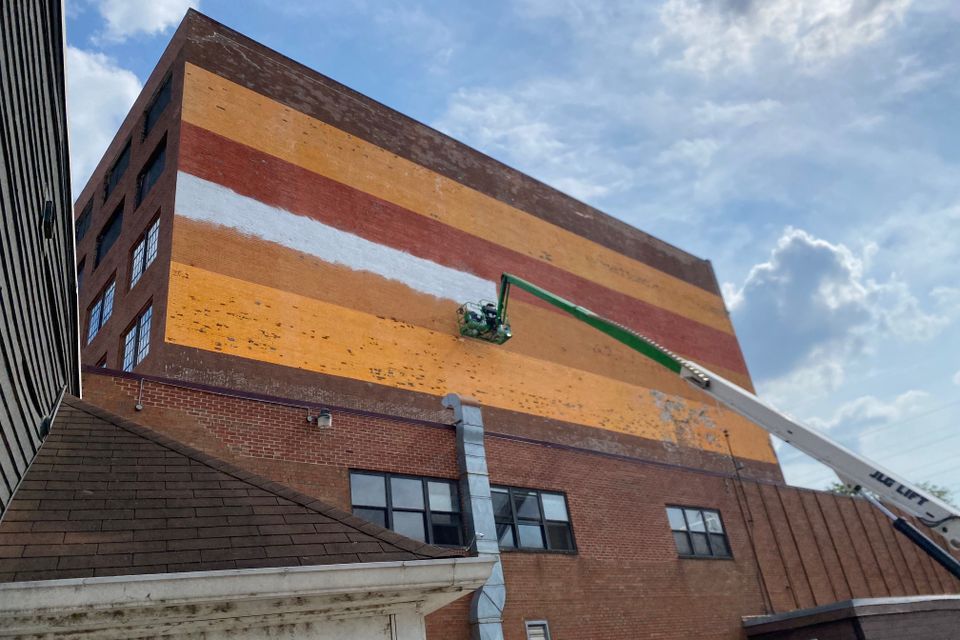 Lc mural wall white paint job w.workers photo