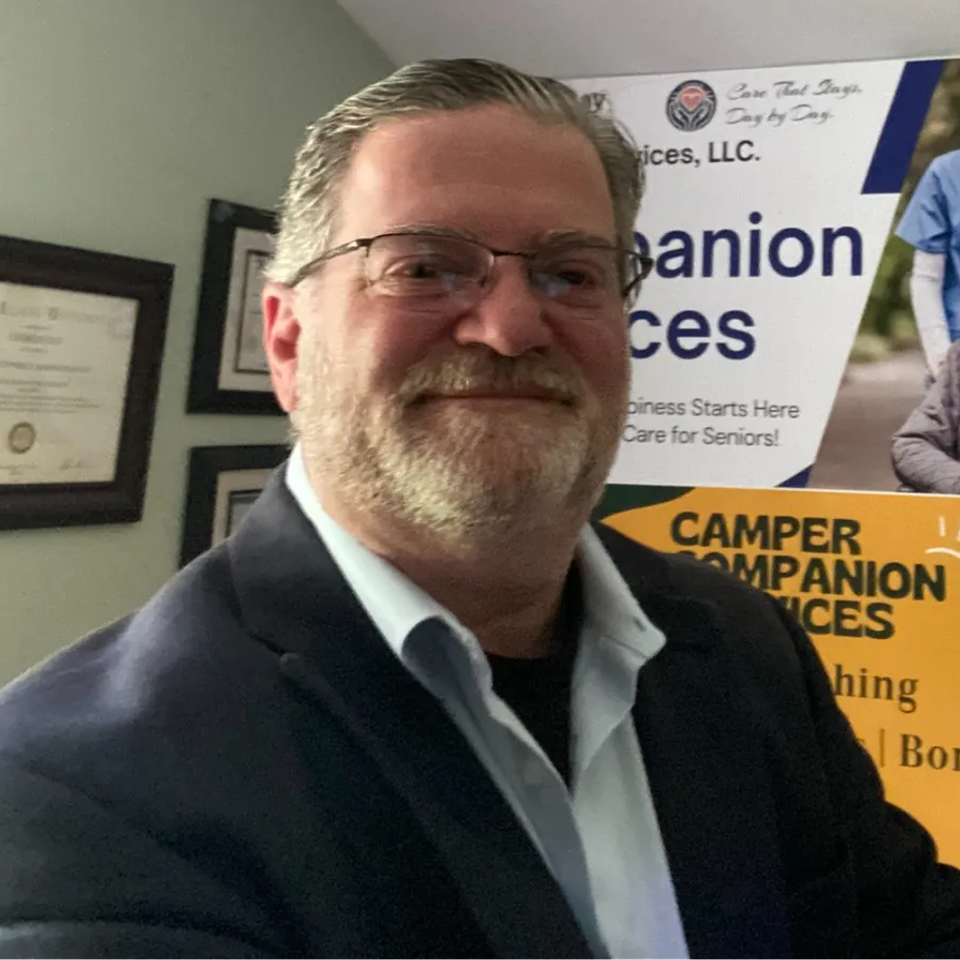 Charles Day, founder of Day to Day Senior Care sitting in his office