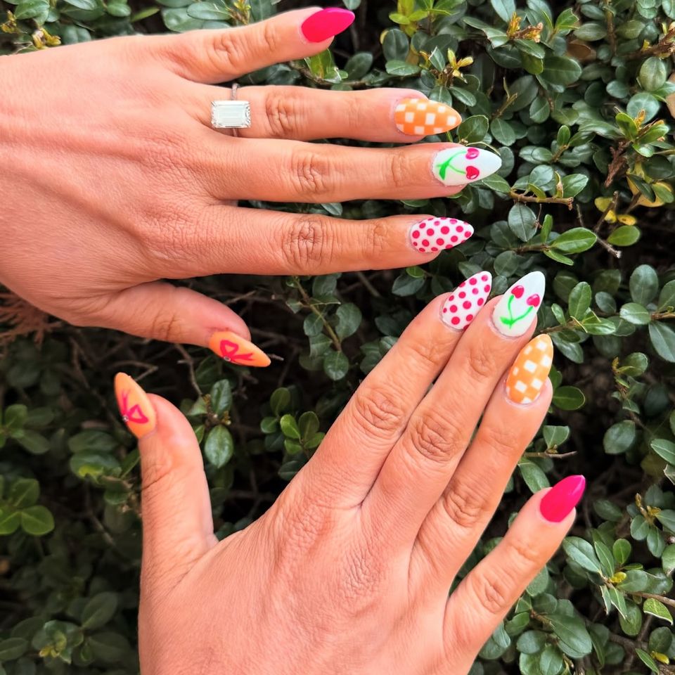 Nail technician student practicing manicure techniques in training salon