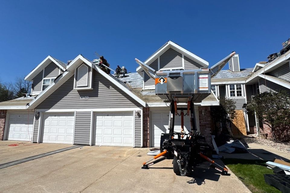Various multi-family roofing services including flat roof, shingle roof, and condo roof replacement in Wisconsin