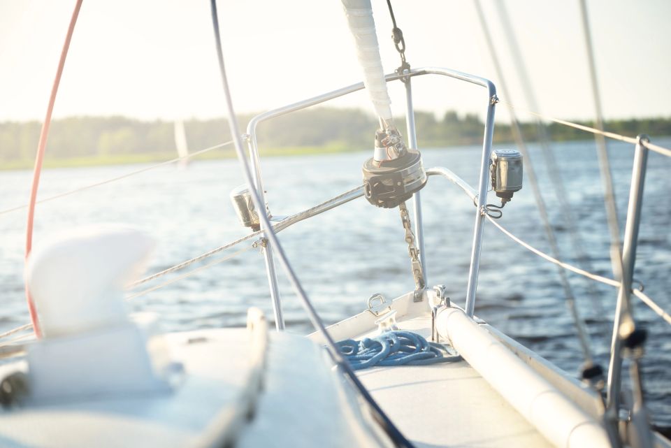 Vistacreate 515365528 stock photo white sloop rigged yacht sailing clear day view deck mast