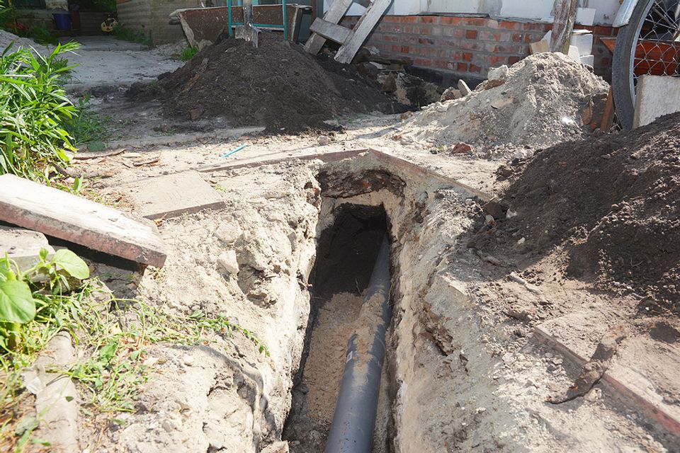 Bigstock digging a trench for a main dr 368235652