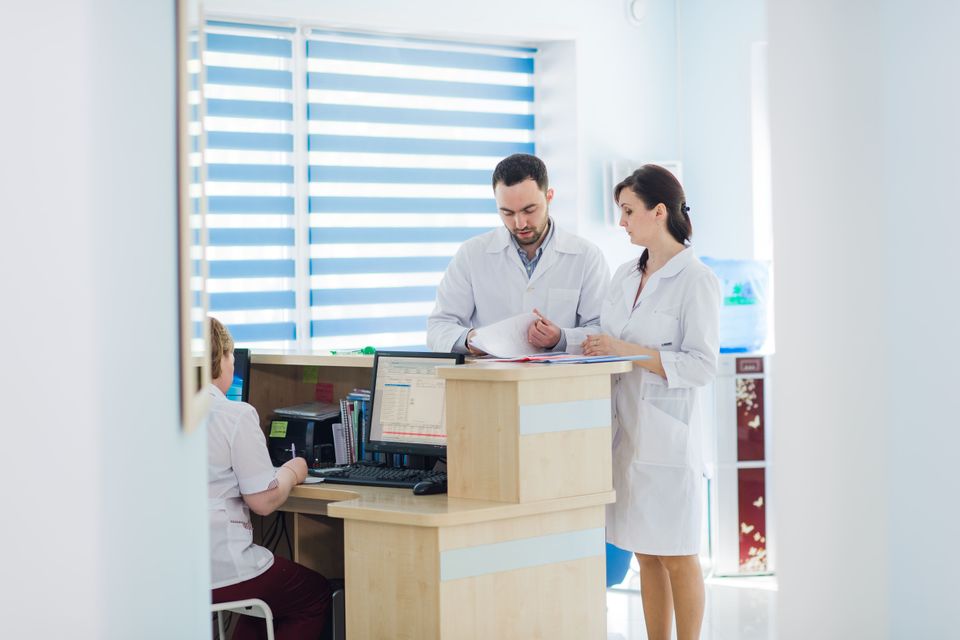 Busy reception in a hospital with doctors and rece 2024 11 03 00 46 48 utc (1)