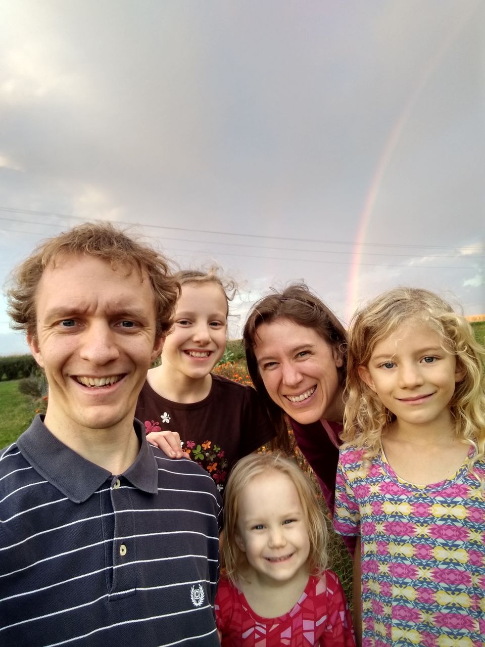 Family picture with rainbow summer 2022