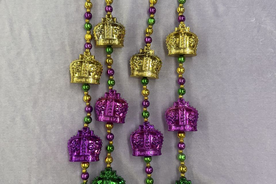 Purple, green and gold beads with purple, green and gold crowns