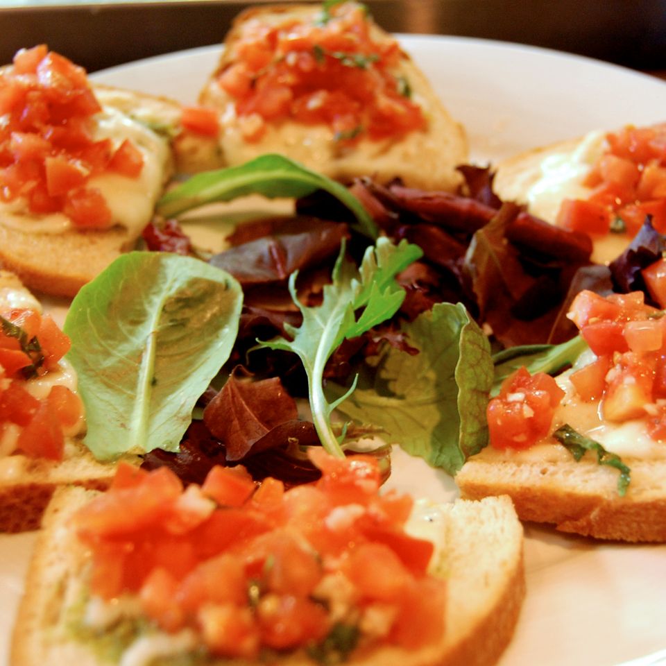 Bruschetta   baked ciabatta bread with pesto  mozzarella   chopped tomatoes. (2)