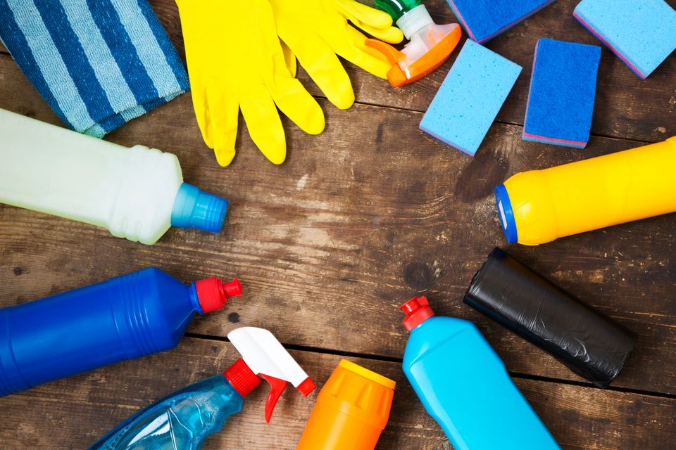 Cleaning products on wooden background