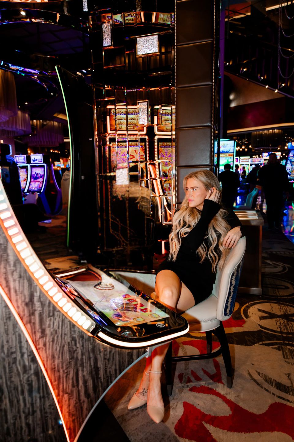 Hills tucking hair and looking away squooshed