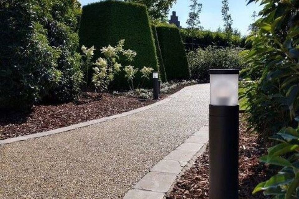 Quartz Carpet by EverStone on a landscaped outdoor walkway.