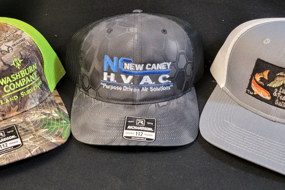 Embroidery Example baseball caps with company logo 