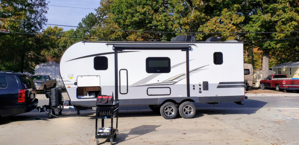 Travel Trailer being checked prior to delivery