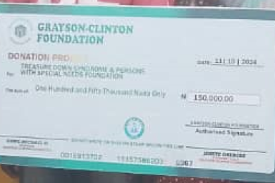 Donation cheque 2   treasure down syndrome