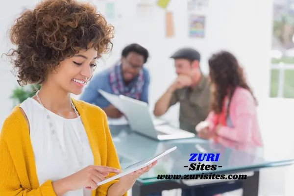 Editor using tablet and smiling.jpg s 1024x1024 w is k 20 c p9ni8rlchn ldhwxywdpy2jetreko718vqfoj6euyd4  original