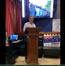 Brad speaking at la mexicana