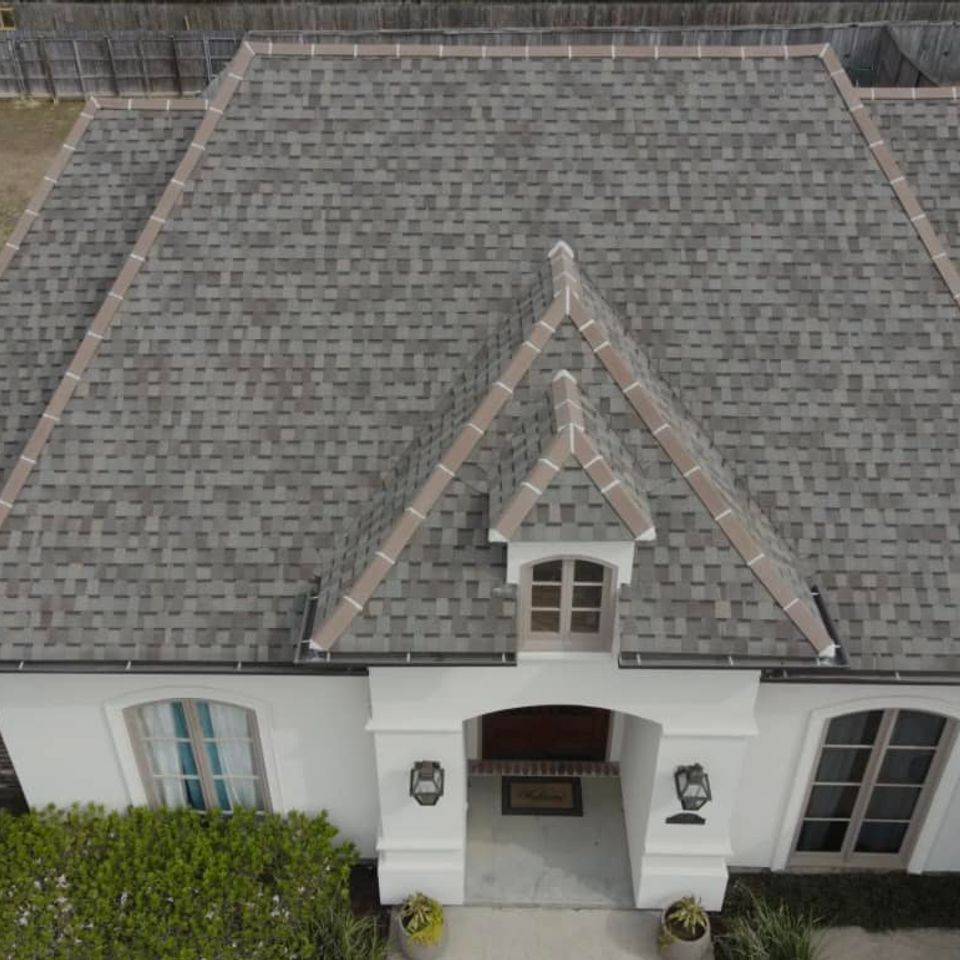 This homeowner chose Driftwood in our Owens Corning Duration brand with Ceramic capping!