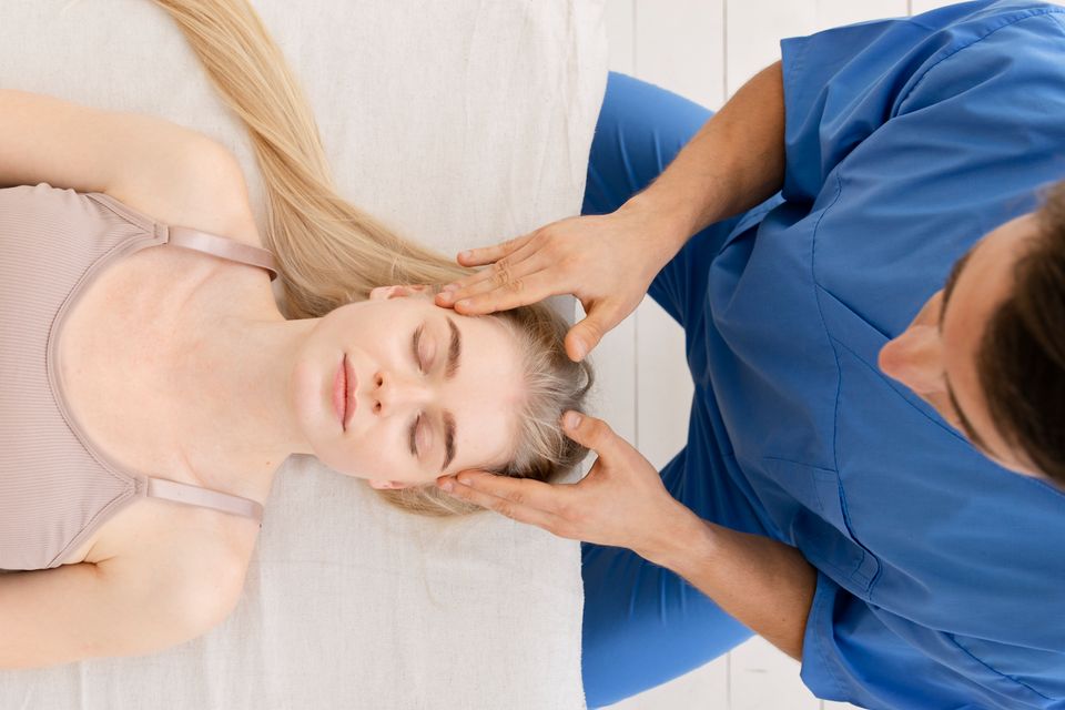 Nurse with patient osteopathy session
