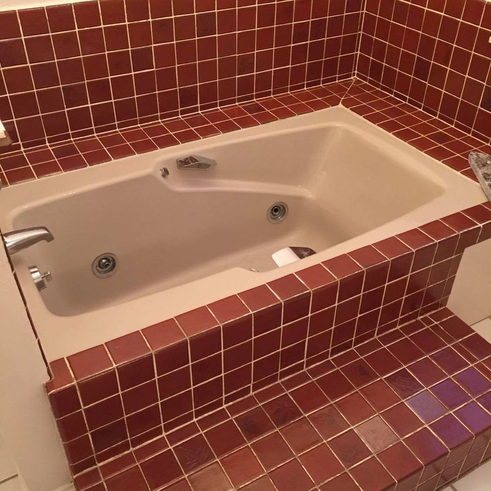 3d solutions general contractors   tulsa oklahoma   bathroom remodel granite edge bathtub and modern tile surround before photo