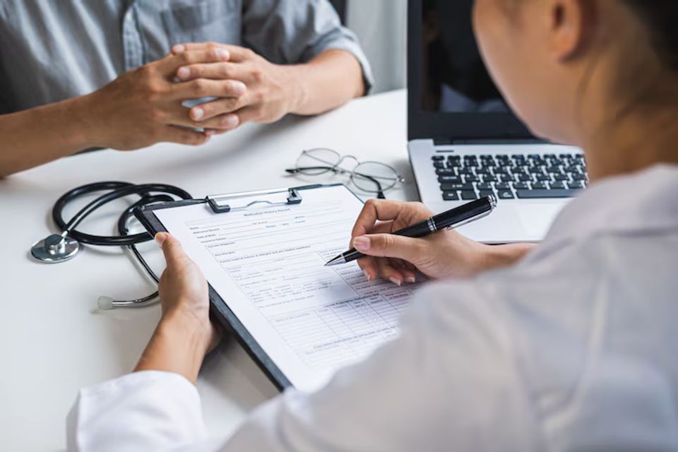 Professional medical doctor consulting her patient hospital healthcare concept 44943 1105