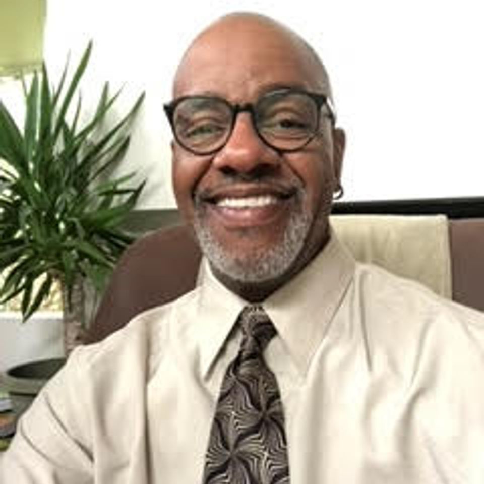 Portrait of Dean Robinson, Minister of Music at Grace Evangelistic Temple Church, whose leadership and musical talents enhance the church’s worship experience.