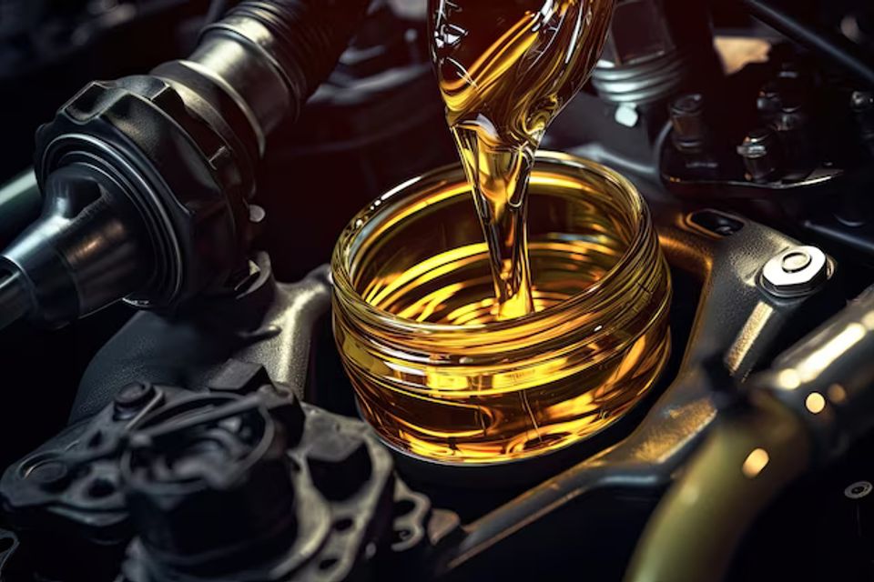 Changing car s engine oil involves filling pouring fresh oil into engine which can be don 908985 16500