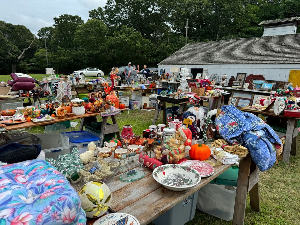 Merchandise spread in front of the Duck Brooder Barn