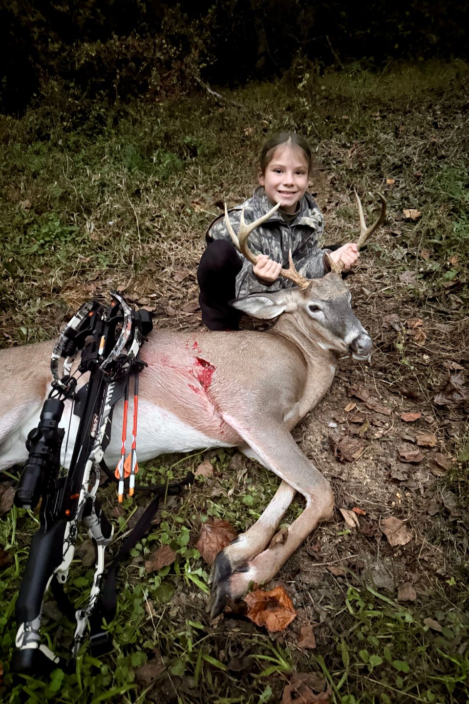 Eight-year-old Natalie moore shot her first buck at 35 yards with her crossbow. 