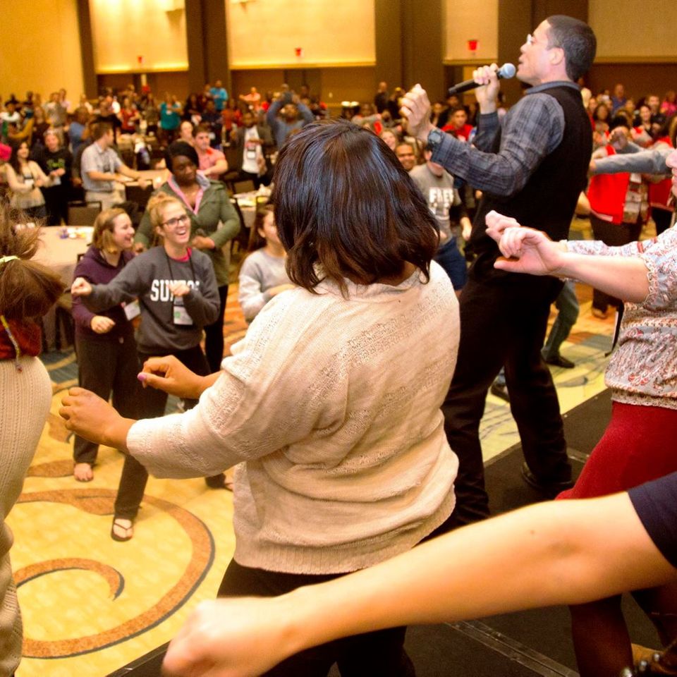Actiona shot of lance dancing at motivational presentation