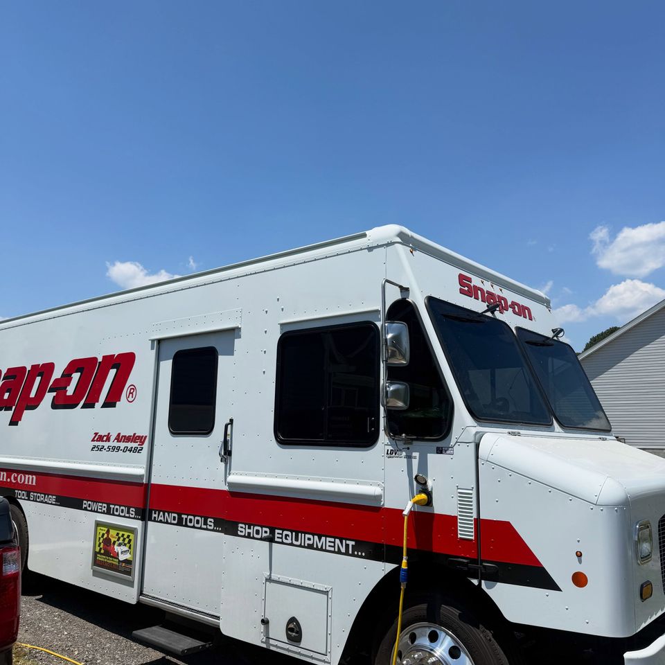 Snap-on tool truck with dark tinted cab and side windows from commercial tinting in Moyock