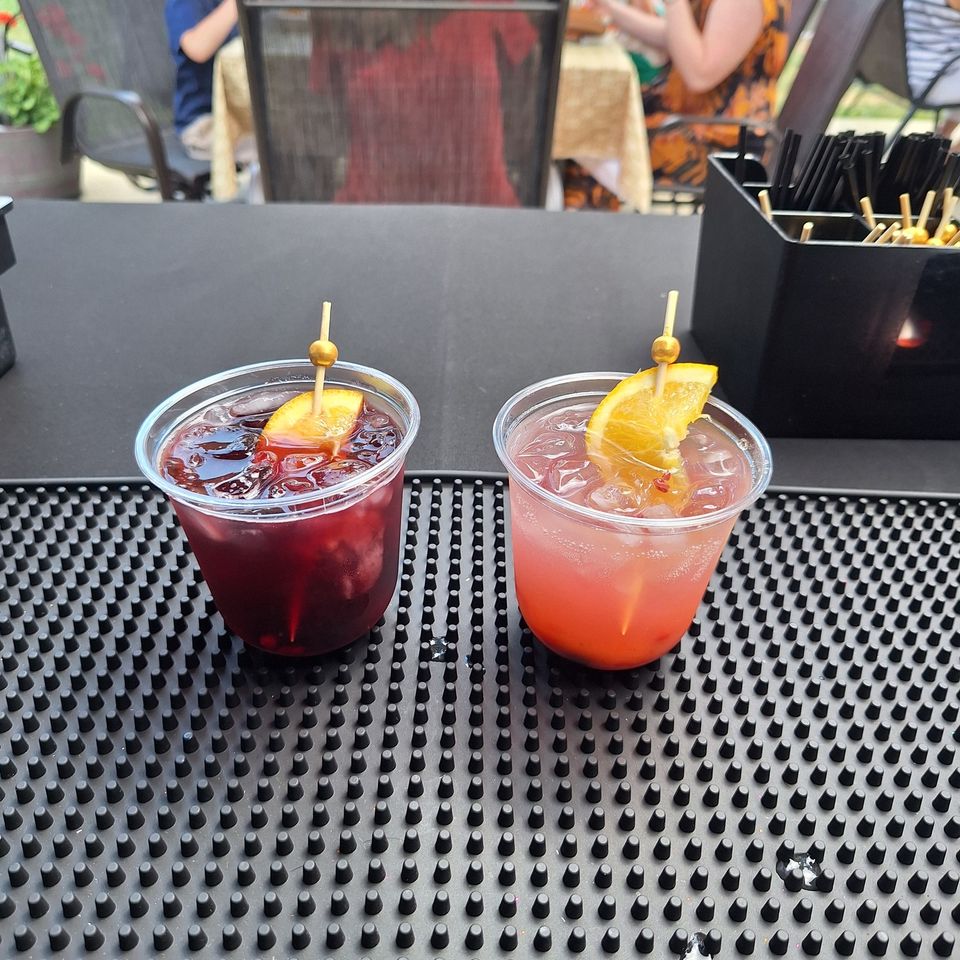 Red Berry SangrRed Berry Sangria cocktail and Berry Baby Bubbly mocktailia Cocktail and Berry Baby Bubbly Mocktail