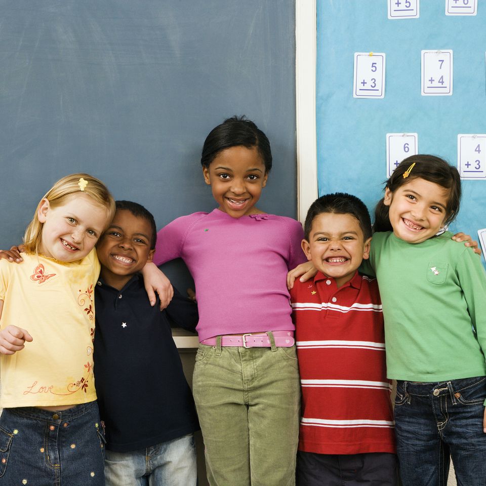 Bigstock students standing in classroom 6742340