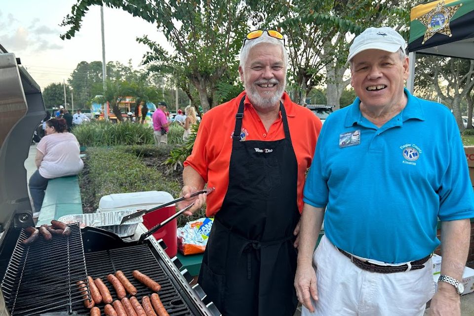 Kiwanis clubs cook hotdags for national night out
