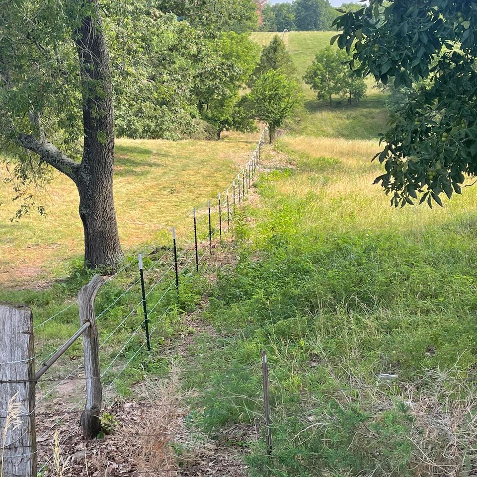 barbed wire farm fence repair or replacement