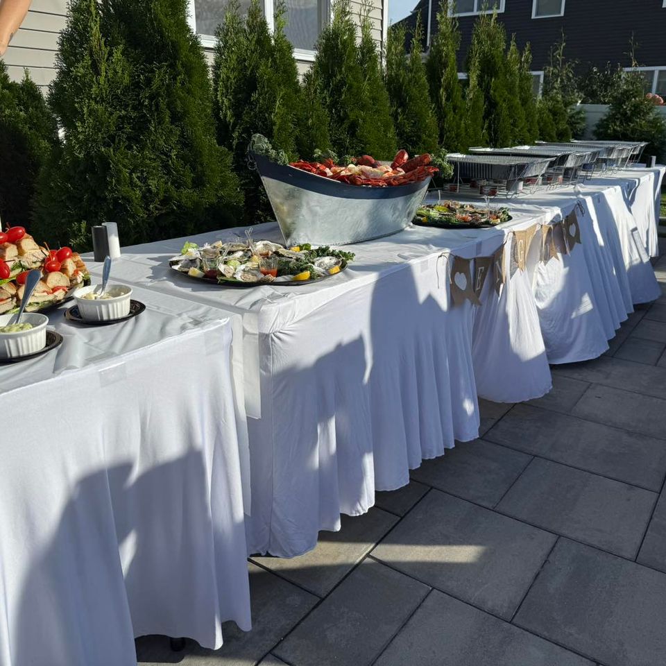 alt="The Party Savers staff bartending and waitressing at a Long Island Engagement Party"