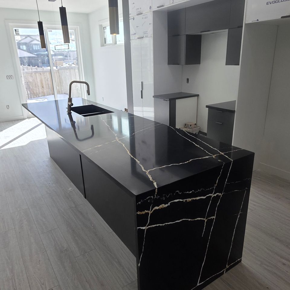 Black countertop with stylish hanging lights