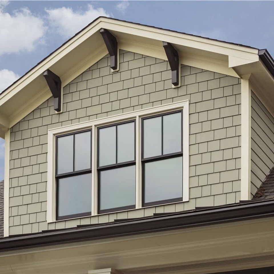 Gray siding dormer window detail